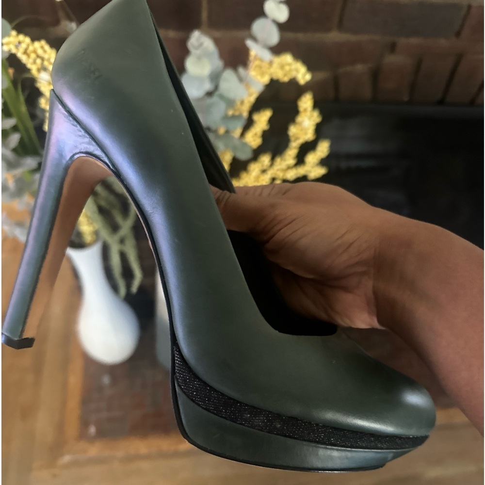 Never worn (was in a car accident and can’t wear heels anymore)
